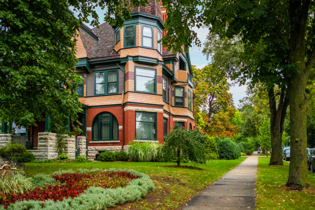 Exterior of Kneeland Walker House in Wauwatosa surrounded by greenery
