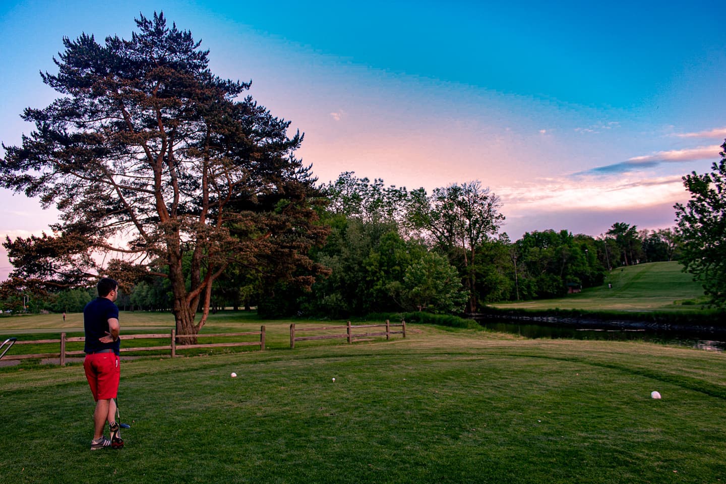 Golfer overlooking sunset at Currie Park Golf Course in Wauwatosa