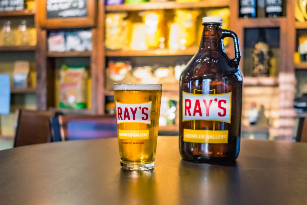 Beer and growler that say "Ray's" on the front